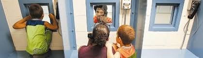 Children visiting inmate